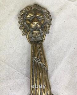 1980s Pair of Lion Head and Tassels Gilded Resin Two Arm Wall Sconces
