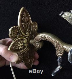 Antique and pretty pair of wall sconces in bronze and cristal