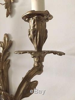 Large cast brass Rococo style wired wall sconces from Decorative Crafts of Conn
