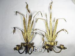 Pair of gold gilt metal foliate decorated two light wall sconces 18