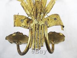 Pair of gold gilt metal foliate decorated two light wall sconces 18
