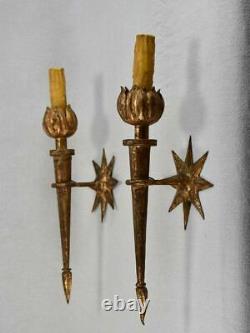 Pair of mid-century wall sconces with star motifs 17